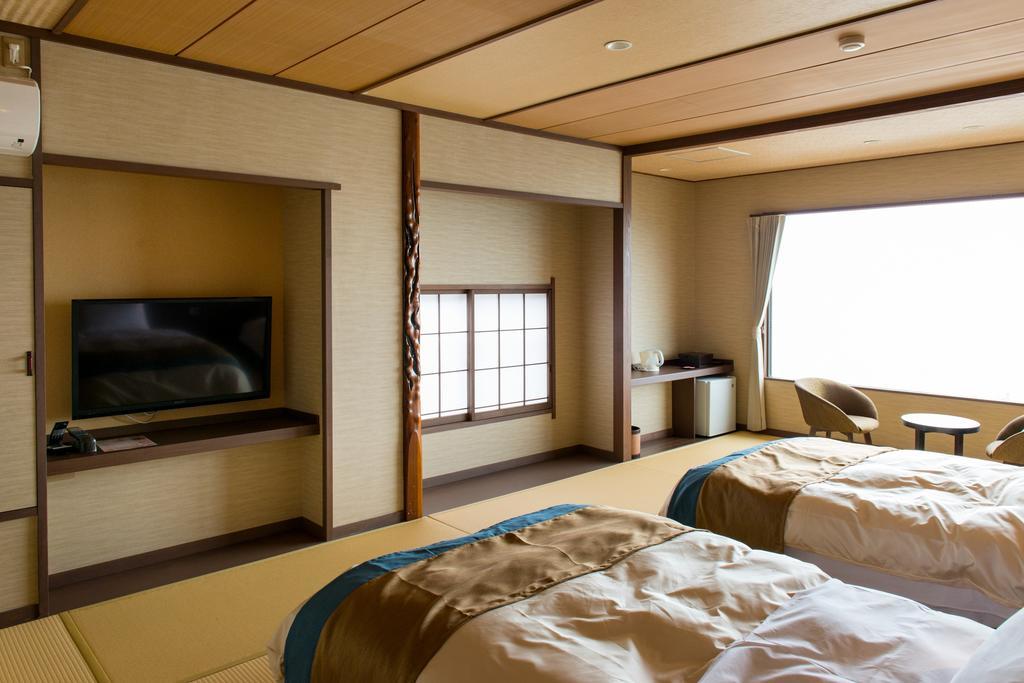 فندق هيغاشيزوفي  ريوكان أوميوساجي الغرفة الصورة