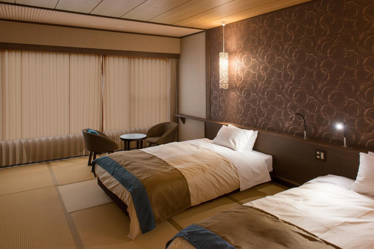 فندق هيغاشيزوفي  ريوكان أوميوساجي الغرفة الصورة